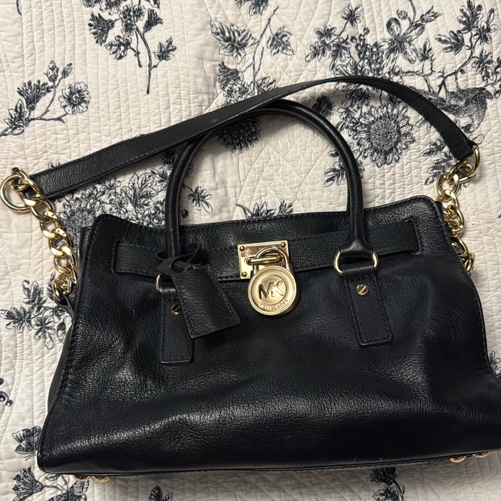 Michael Kors black with gold hardware purse